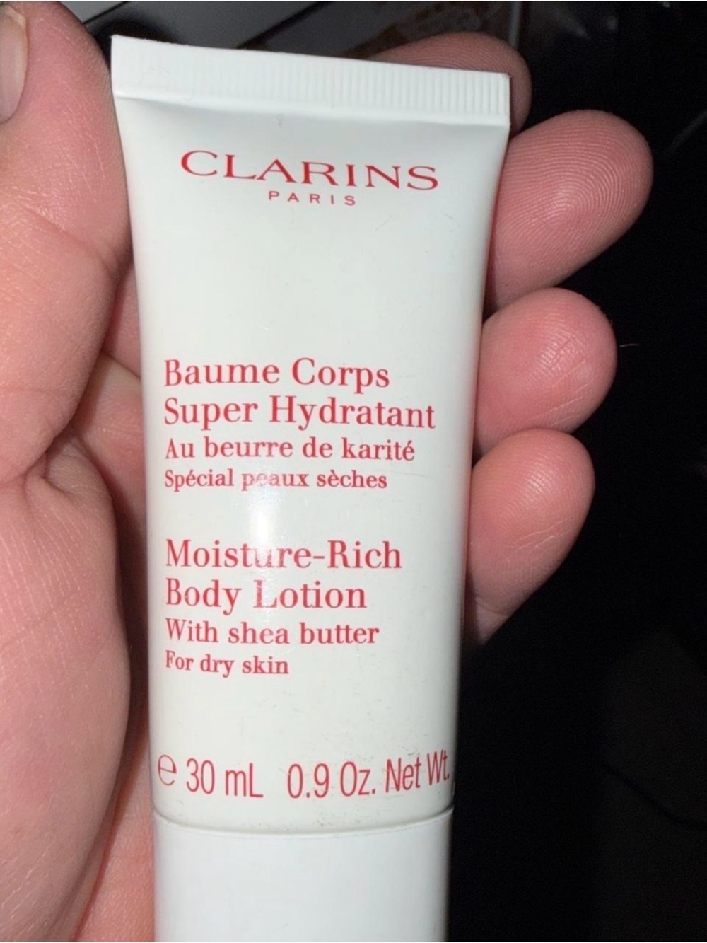 Clarins Moisture-Rich Body Lotion Tube in White and Red